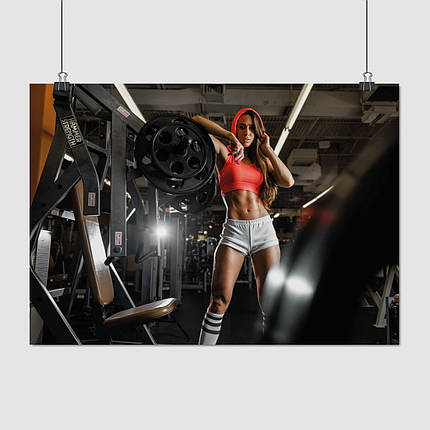 Плакат "Дівчина в червоному топі серед тренажерів", 43×60см, фото 1