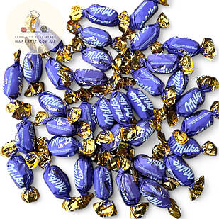 Шоколадні цукерки Milka Choclairs, м'яка іриска з шоколадом, вагові