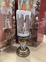 Дід Мороз Декоративна новорічна LED свічка зі снігом, 25см, від батарейок та USB