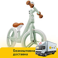 Біговел Kinderkraft Fly Plus Mint (EVA колеса 12 дюймів, магнієва рама, регулювання сидіння)