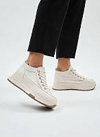 Жіночі шкіряні кросівки на танкетці Alssy