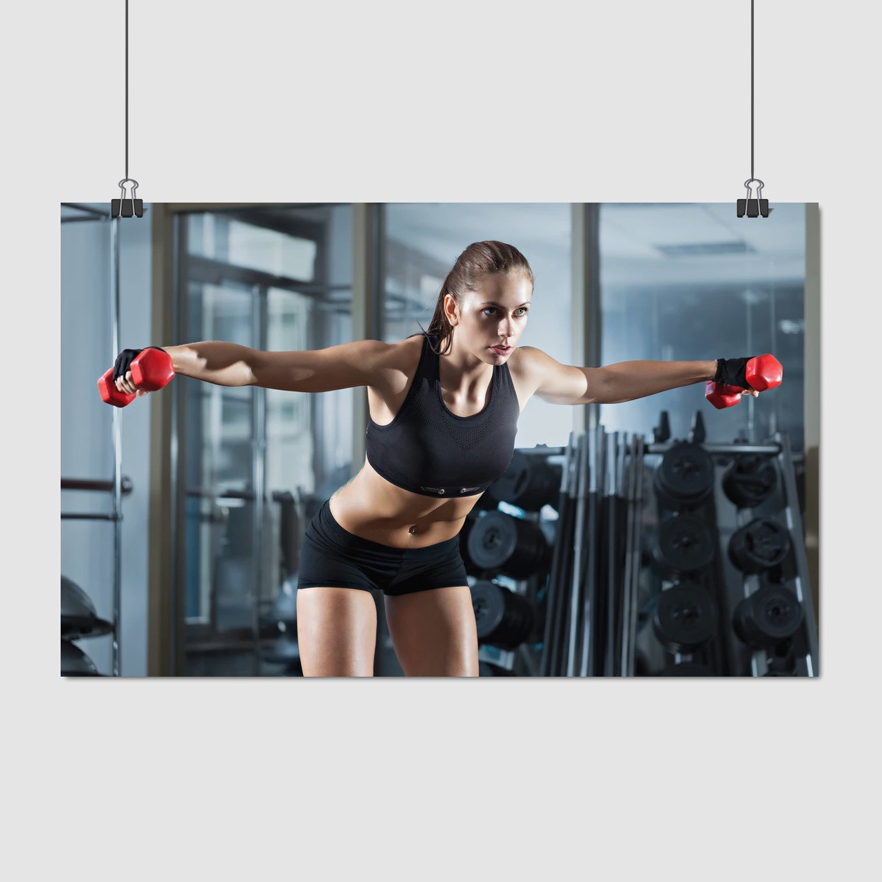 Плакат "Дівчина тренується із гантелями", 38×60см