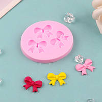 Молд силіконовий Бантики 58 на 50 мм рожевий