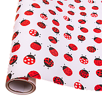 Подарунковий папір 70 см х 10 м "Сонечка"