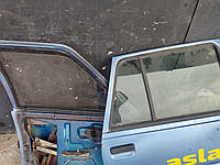 Дверне заднє куточок скло бічне ЗАЗ Славута