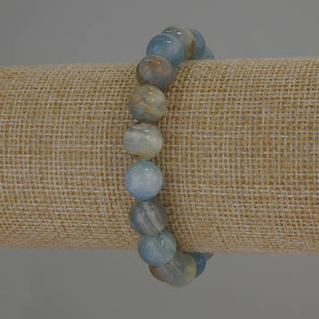 Браслет Кальцит блакитний гладка кулька d-10мм+- L-18мм+- стрейч
