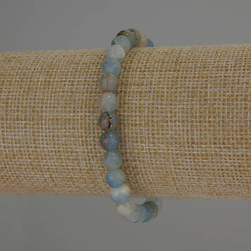 Браслет Кальцит блакитний гладка кулька d-6мм+- L-18мм+- стрейч