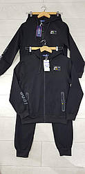 Чорний спортивний костюм для хлопчика в розмірі 140 і 146