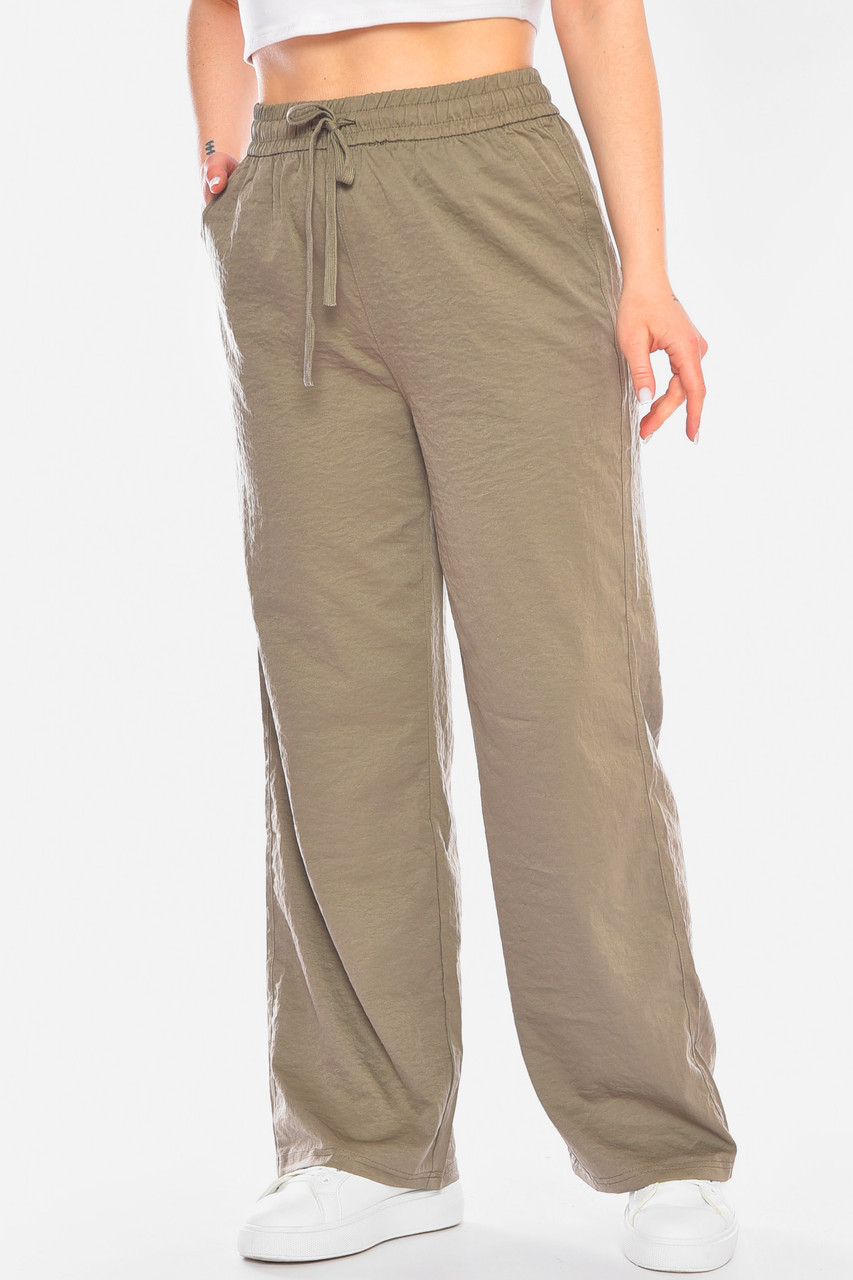 Штани жіночі однотонні теммно-бежевого кольору 198240S, фото 1