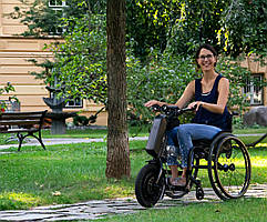 Електричний привод із кріпленням для ручних інвалідних колясок. KLAXON Klick Race Standard 1000w/11Ah/50km