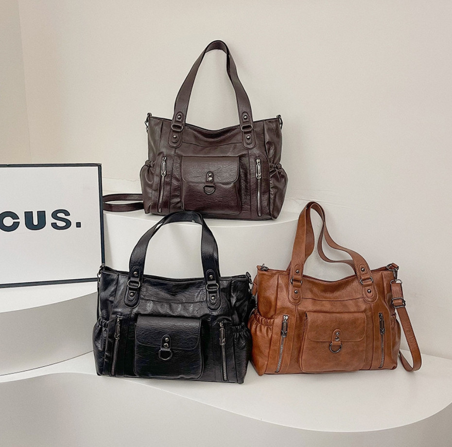 Містка жіноча сумка для щоденного використання