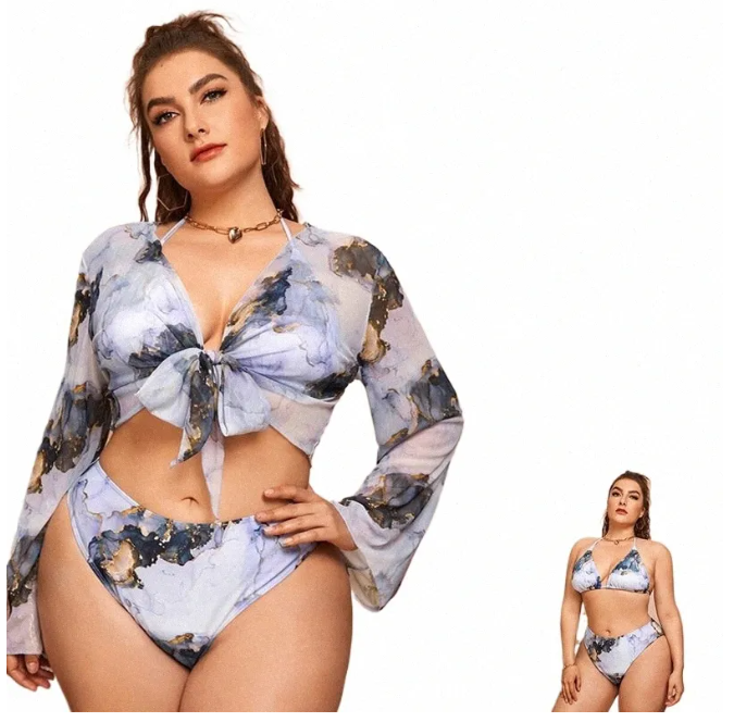 Роздільний жіночий купальник з високими трусиками, ліфом та накидкою парео у сірому кольорі.