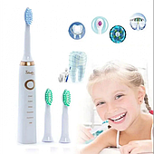 Електрична зубна щітка Shuke SK-601 з 4 насадками Біла