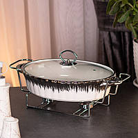 Керамічна овальна мармітниця об'ємом 2 л літра, на металевій підставці з підігрівом