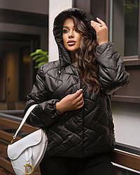 Коротка жіноча куртка асіметрія чорного кольору