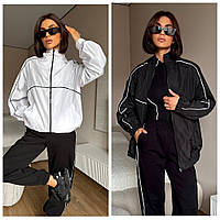 Жіноча демісезонна куртка з плащівки з кантами. Розмір: 42-46, 46-50. Кольори: чорний, білий.