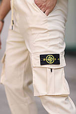 Чоловічі штани Stone Island світлі Джогери Стон Айленд із бічними кишенями, фото 3
