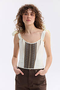 Орнаментовані топи на шнурівці