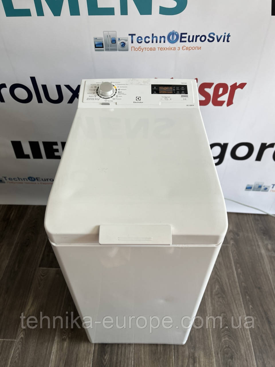 Пральна машина з вертикальним завантаженням Electrolux вживана 210325/14R