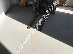 Полімерна підлога з кварцовим піском та армуванням для високих навантажень