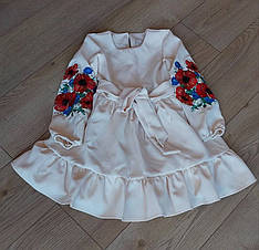 Сукня дитяча кремового кольору з яскравою вишивкою на рукавах розміри 86, 116.
