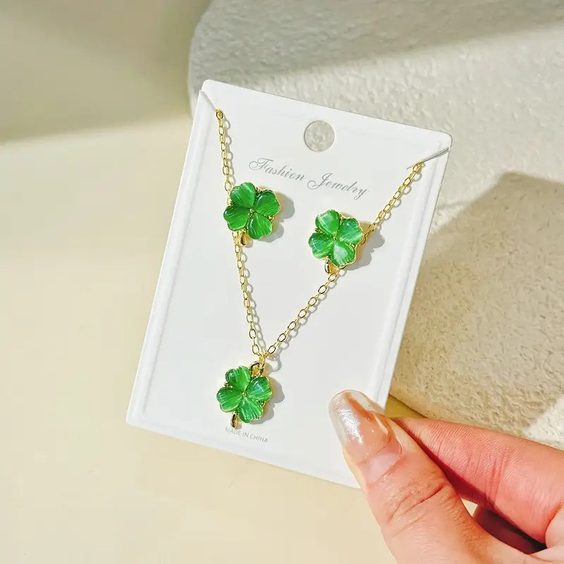 Набір ювелірної біжутерії золотистий кулон на ланцюжку та сережки у вигляді чотирилистої конюшини, фото 1