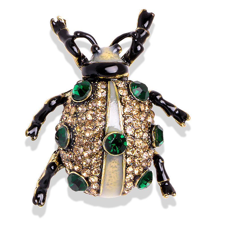 Брошка металева золотиста сонечко в стразах покрита кольоровою емаллю розмір виробу 40х35 мм