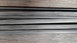 Вставка пластикова,сіра- меланж універсальна в економпанель.