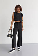Літній легкий жіночий костюм зі штанами і топом із зав'язками чорний розмір Л