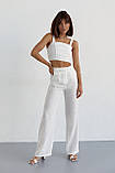 Бавовняний жіночий костюм зі штанами і топом молочний літній брючний костюм з легкої тканини розмір Л, фото 6