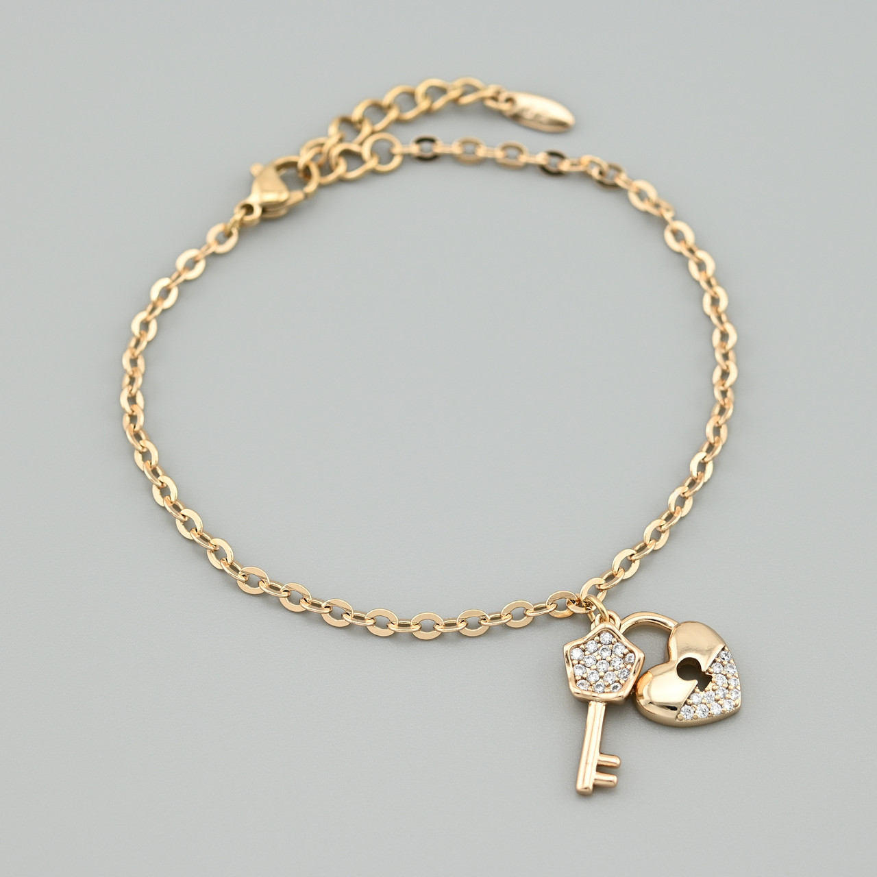 Браслет Сердечко з ключем 50432 ширина 2.5 мм білі фіаніти позолота 18К довжина 17+3, фото 1