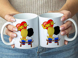 Парні білі чашки з принтом "Love is..."