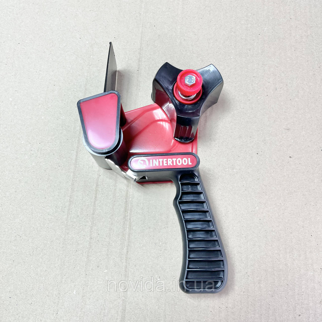 Диспенсер для пакувального скотчу, 50мм INTERTOOL HT-6044