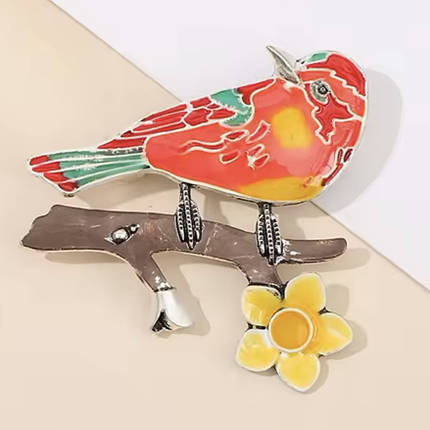 Брошка металева на сріблястій основі птах на гілочці з квіточкою покрита кольоровою емаллю розмір 50х50 мм, фото 1