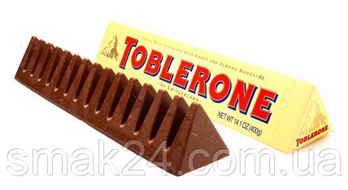 Швейцарський молочний шоколад Tobleron з медом і мигдальною нугою 100 г