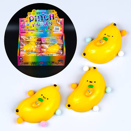 Іграшка антистрес Банан з іграшкою, 9,5 см 16 шт упаковка, фото 1