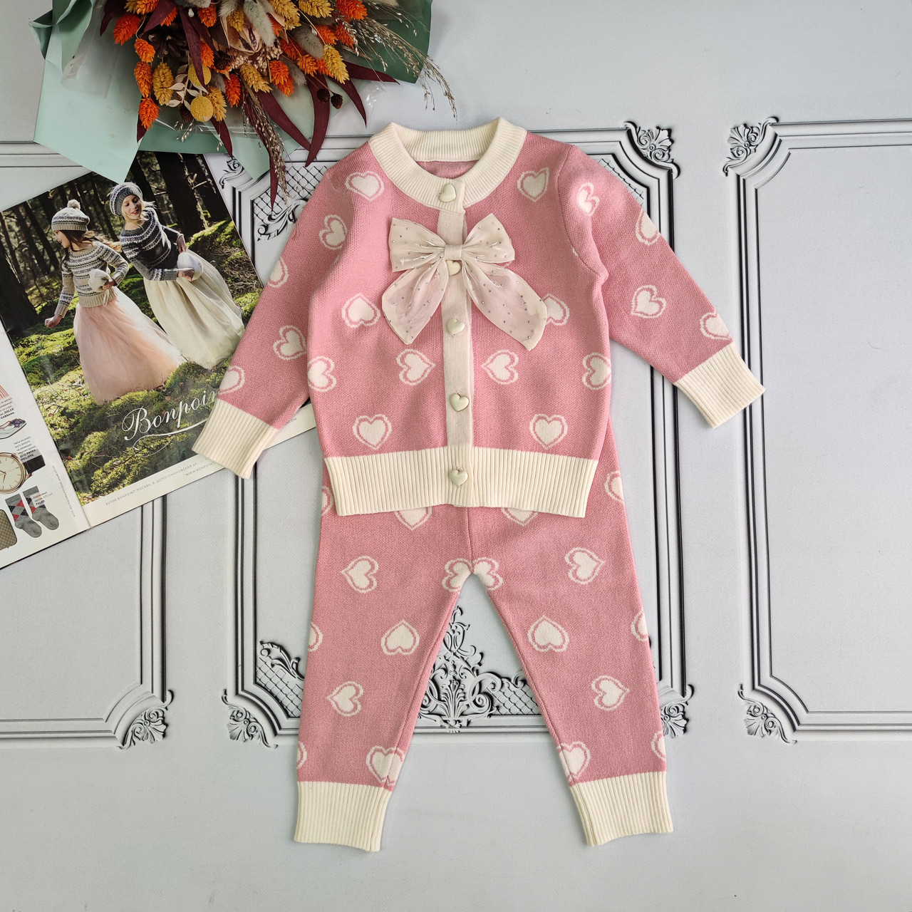 Дитячий рожевий в'язаний костюм зі штанами для дівчинки