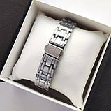 Жіночий годинник Guess (Гес) з римськими цифрами сріблястий, камінчики навколо, дата - код 2482b, фото 5