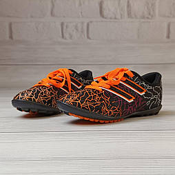 Чорно-оранжеві футбольні кросівки для хлопчика у 33 і 35 розмірі