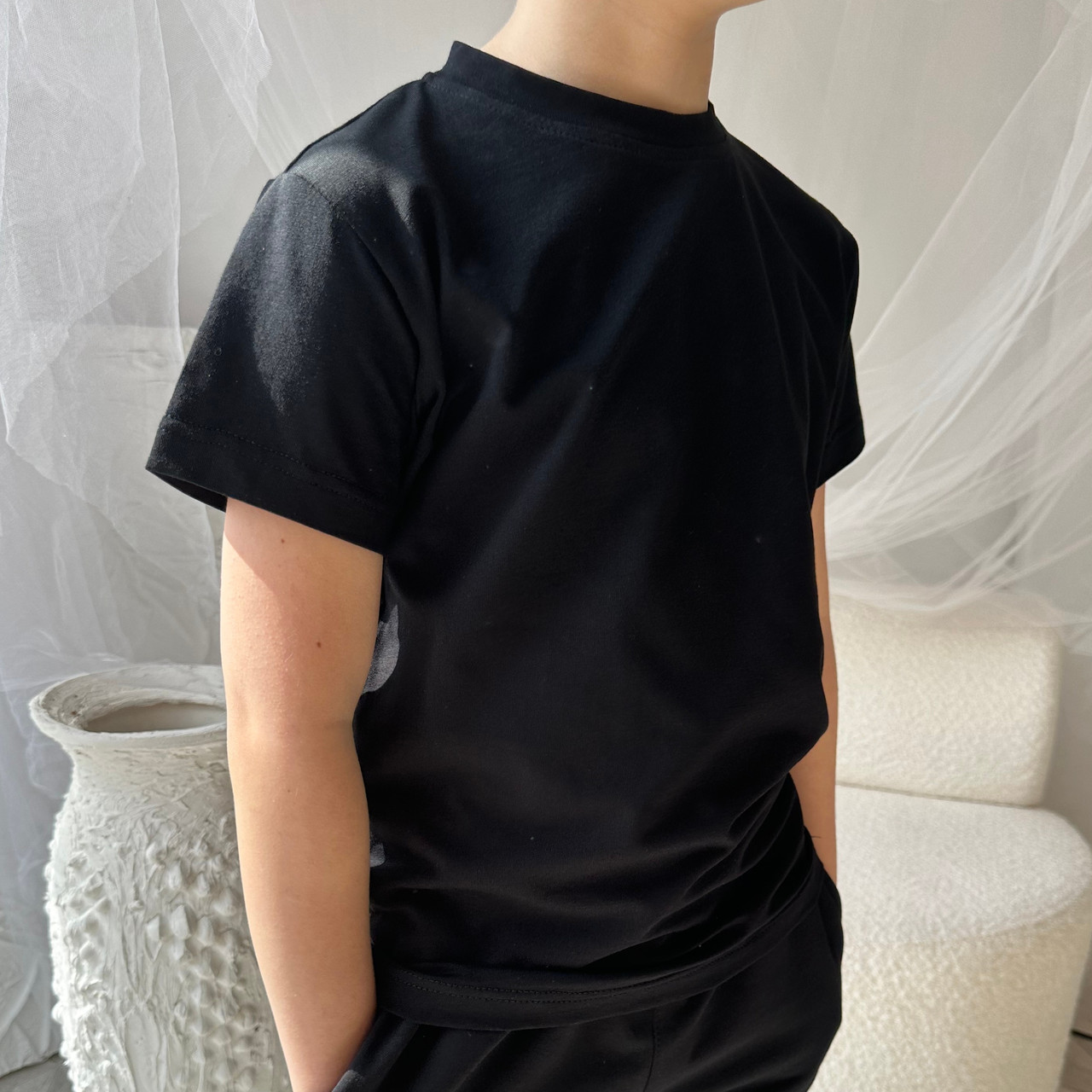 Футболка на хлопчика 134 см 003559 Чорна