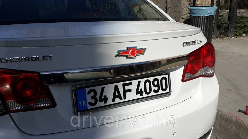 Накладка хромированная над номером Chevrolet Cruze Sd 2009-, Carmos, 6459660, фото 1