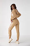 Костюм спортивний жіночий з блискучими вставками PERRY - бежевий цвет, S (є розміри), фото 2