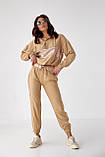 Костюм спортивний жіночий з блискучими вставками PERRY - бежевий цвет, S (є розміри), фото 5