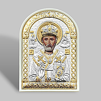 Ікона срібна 6,2х8,8 см на білому пластику. Срібло 925°, позолота. Миколай Чудотворець.