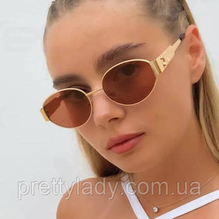 Сонцезахисні окуляри жіночі овальні Backstage коричневі із золотом