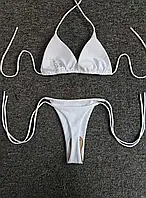 Роздільний жіночий купальник білого кольору трикутники на зав'язках шнурки