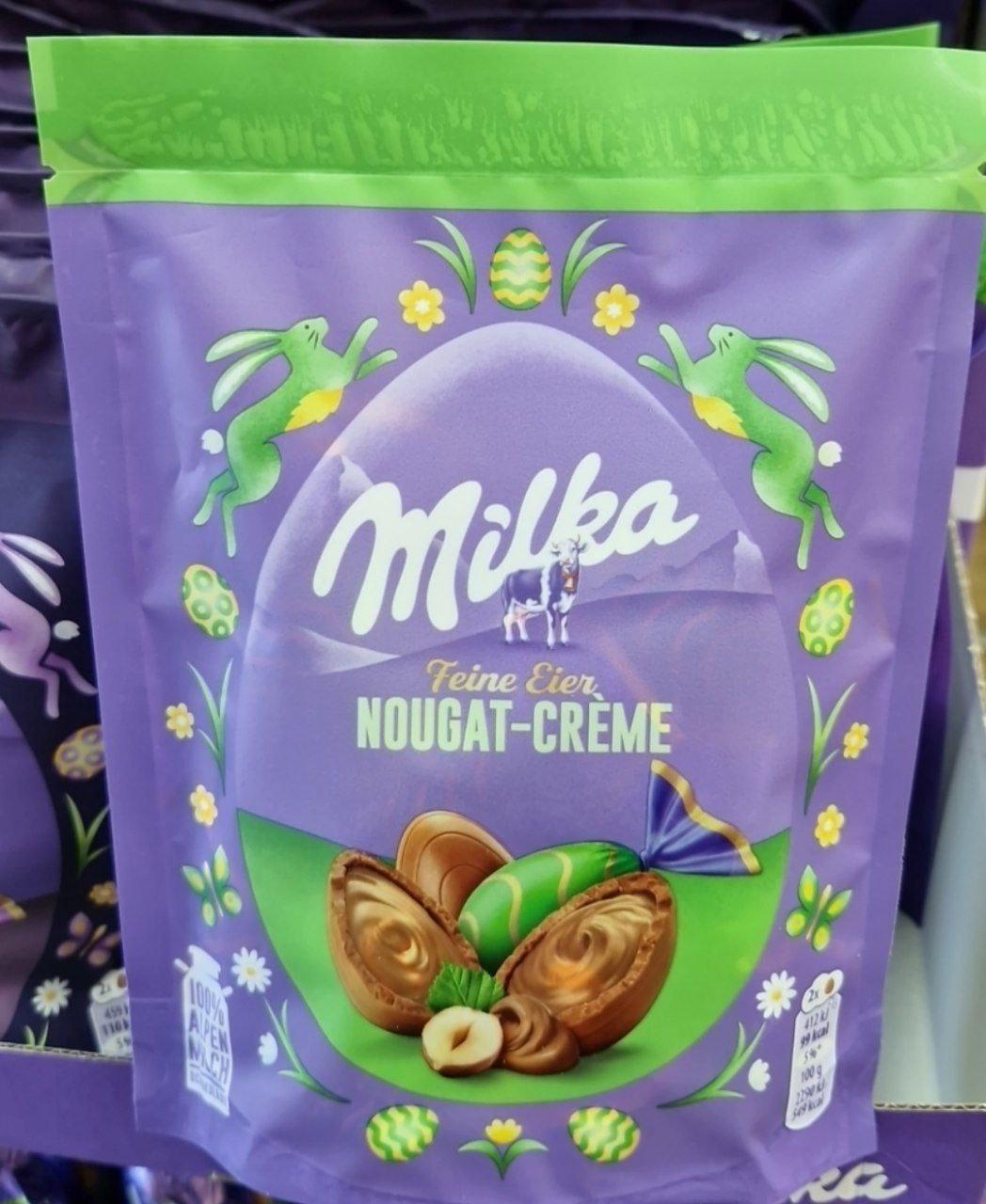 Шоколадні цукерки Milka Feine Eier Nougat Creme 90 г.