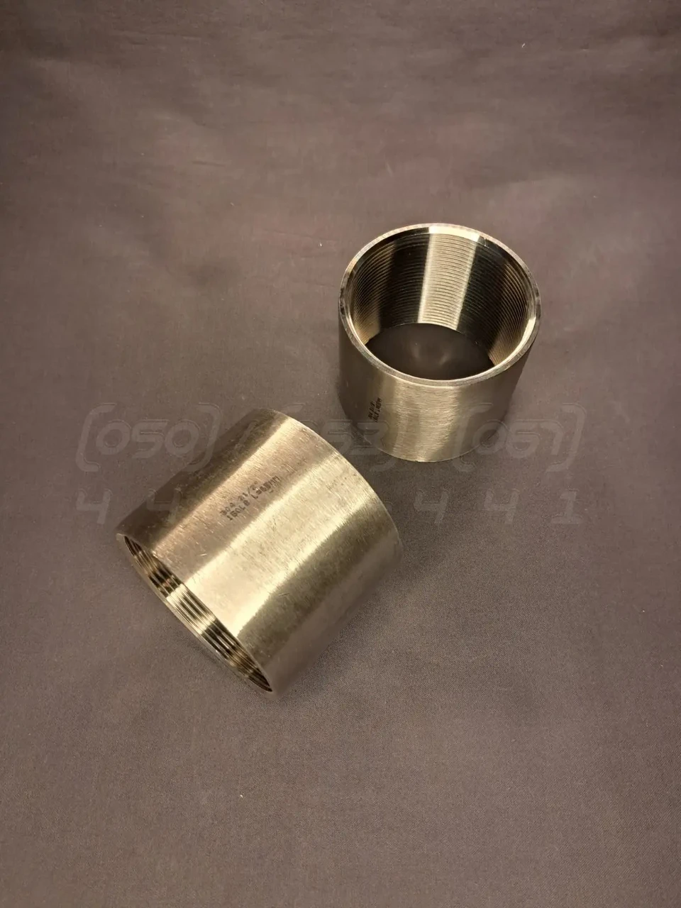 Муфта пряма різьбова Ду 65 (2"1/2) з нержавіючої сталі AISI304, повністю прорізана