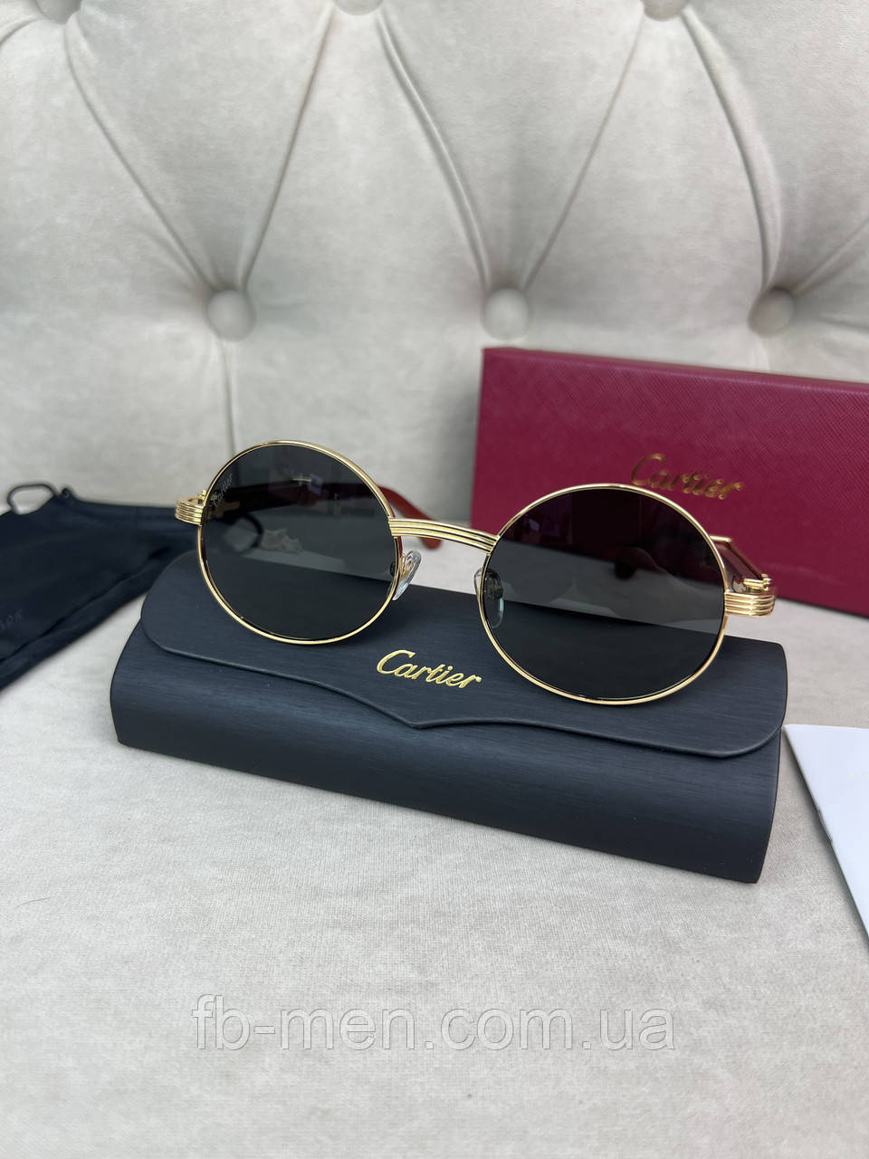 Сонцезахисні окуляри Cartier круглі в золотій оправі