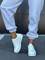 Спортивные массивные кожаные женские кеды на толстой подошве демисезонные модные кроссовки на шнурках для